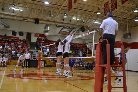 Madi Warmund and Landry Moffett put up a big block against La Vernia.
