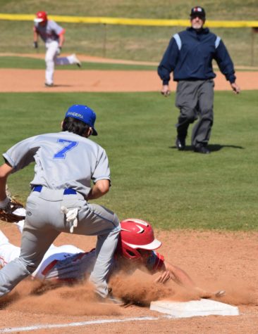 Daylon Nebgen slides into third base.
