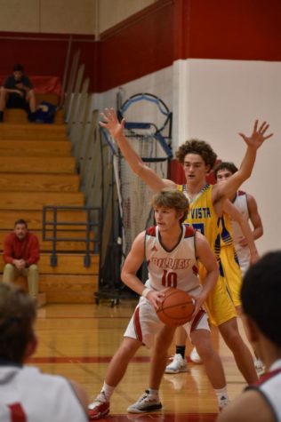 Dalton Rabon looks to pass the ball out for a three. Rabon helped the Billies to a 73-47 win over Lago Vista.