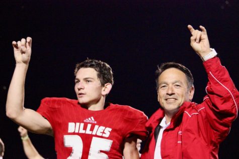 Coach Stafford and Jabin Gipson sing the Alma Matter after winning their first district game
