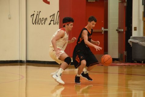 Felix Cruz prevents the ball handler from getting by him.