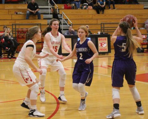 Lauren Beyer and Anna Gold play defense against the Greyhounds.