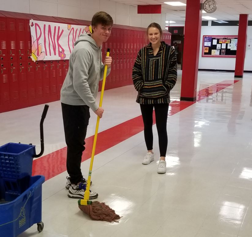 Cristian Reno and Caitie Huff clean up after their Survivorship Curve Bubble Lab in AP Environmental Science.  (Thanks for the photo, Mrs. Gregg.) 